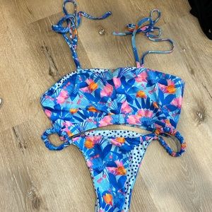 Moana lounging lemur bathing suit set, size large